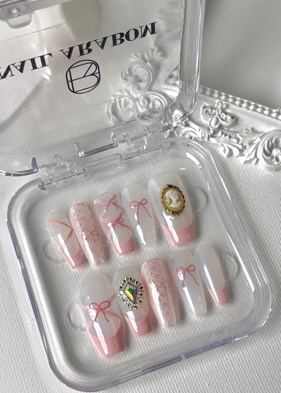 Close-up view of Luxury & Lovely St. press-on nails featuring exquisite designs