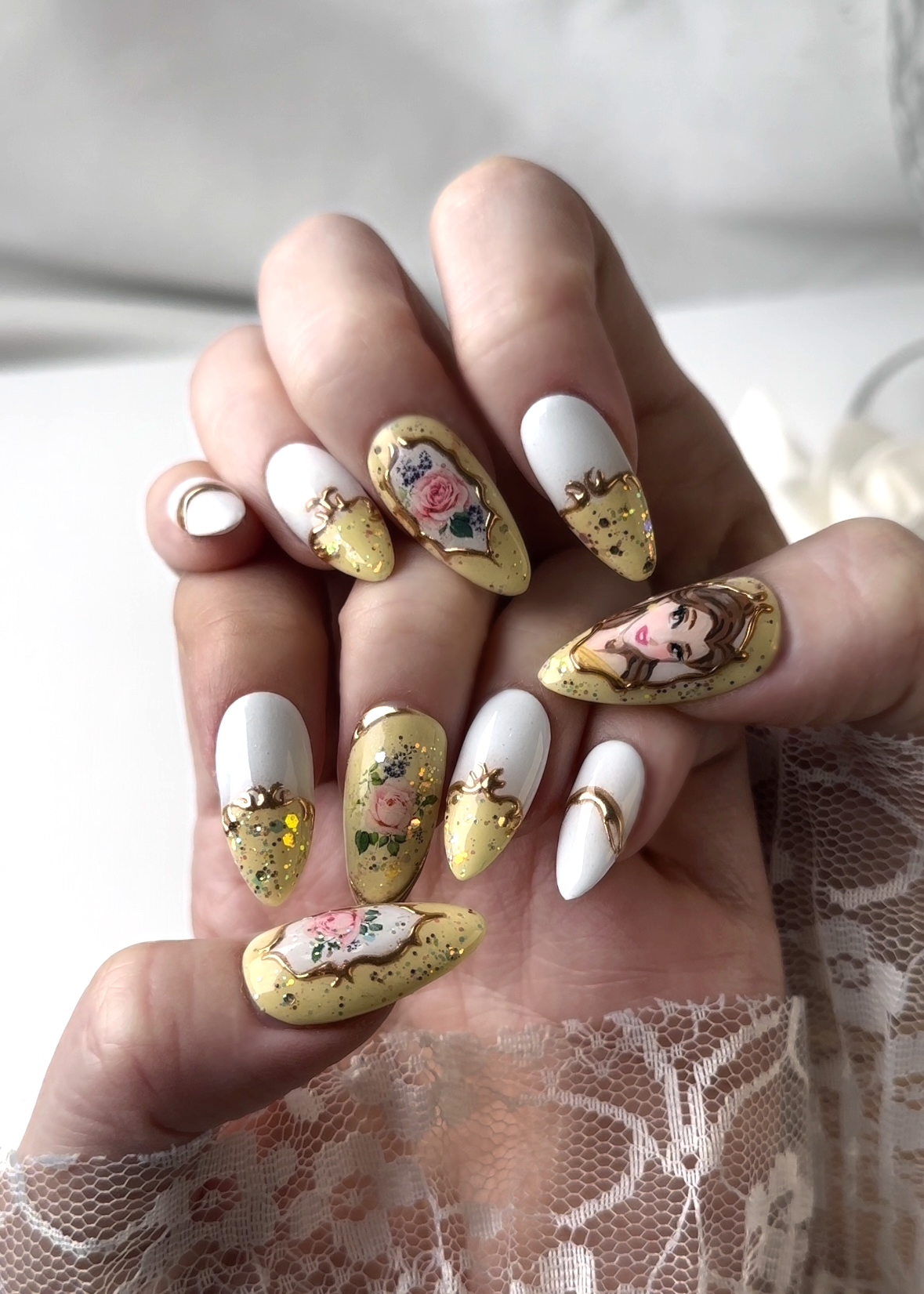 Close-up view of Belle and English Rose Garden press-on nails featuring elegant and classic designs pressons nails actual look when worn.