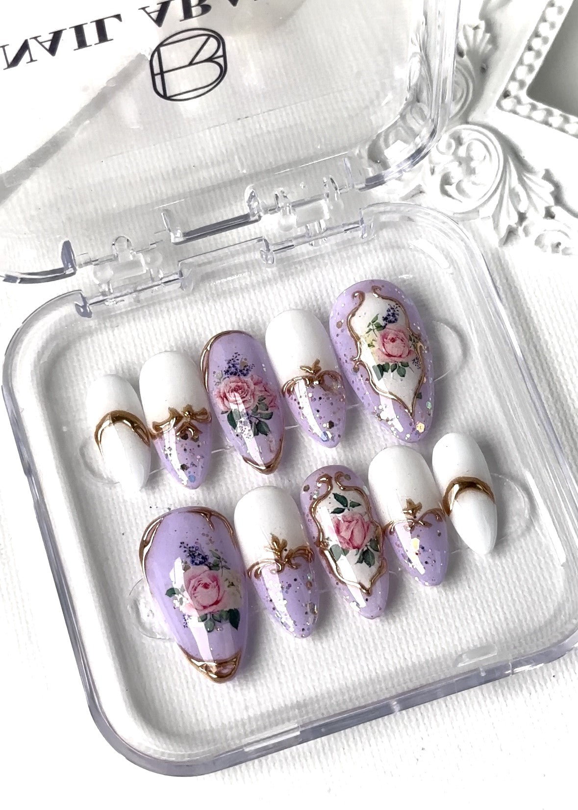 Close-up view of English Rose Garden-Vintage Lilac press-on nails featuring elegant and classic design fit for royalty