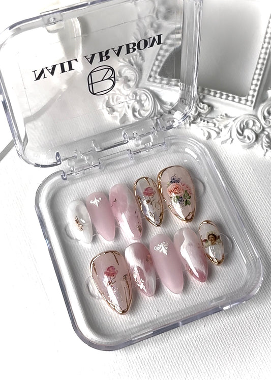 Close-up view of English Rose Garden-Vintage Pink press-on nails featuring elegant and classic design with fresh floral detail