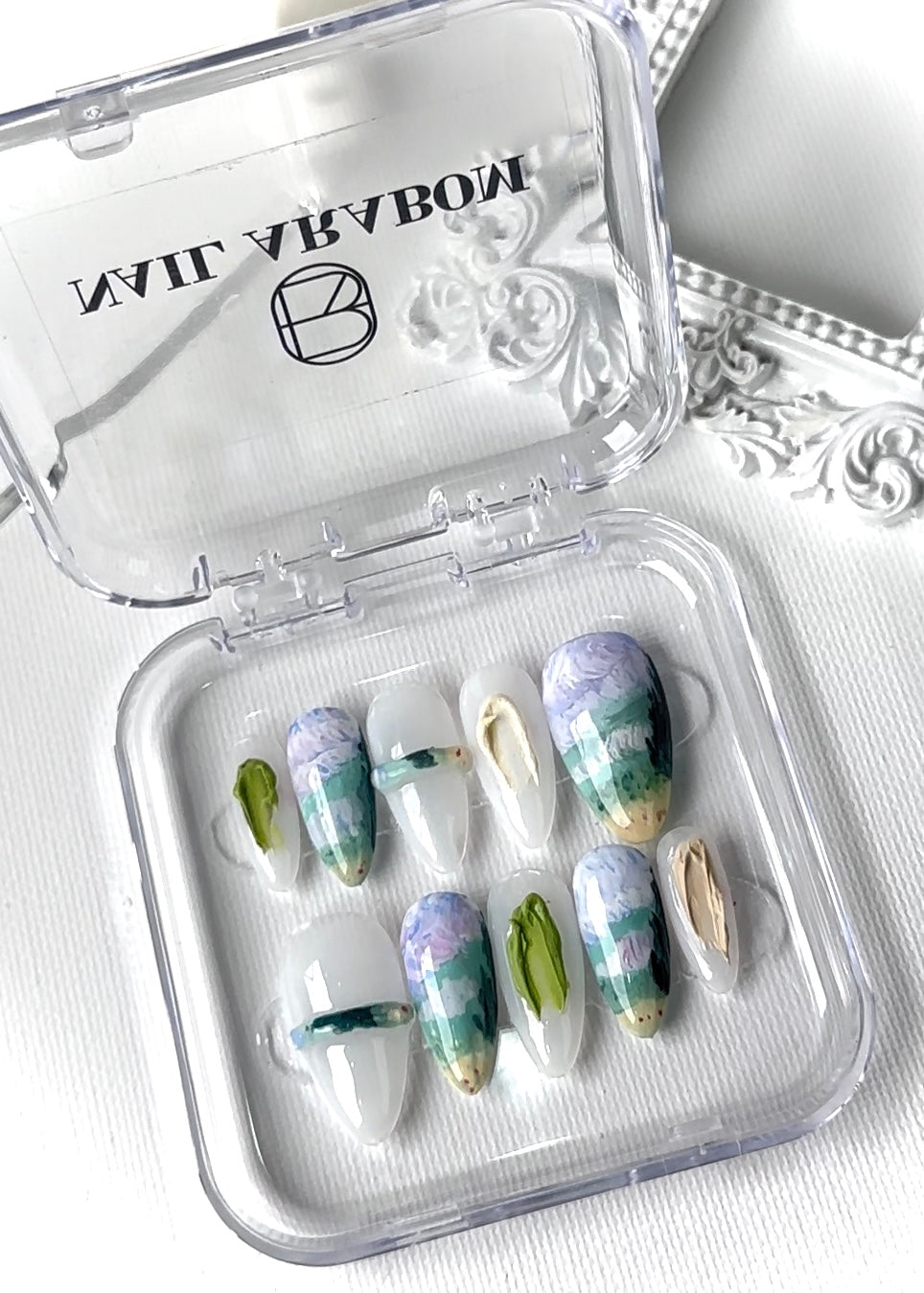 Close-up view of Vincent's Cypresses press-on nails featuring artistic and classic design inspired by Van Gogh's painting